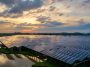The solar power plant is in a beautiful view at dusk