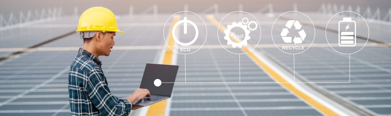 Asian Engineer use computer Checking Solar power Energy in factory